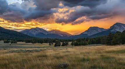 Sunset Over Mountains with Dramatic Clouds and Lush Greenery