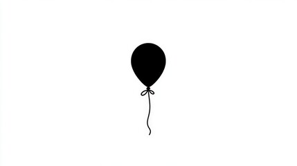 Obraz premium Minimalist black balloon on white background with simple design