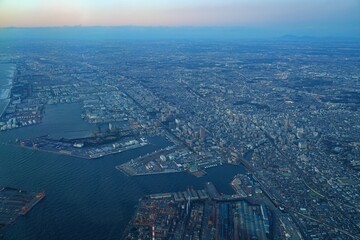 Aerial view of the Tokyo Bay, Japan, at nightfall in approach at Haneda Airport