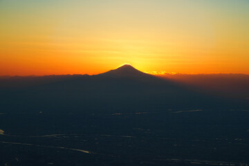 Sunset sky above the clouds with a view of Mount Fuji near Tokyo, Japan