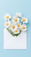 Obraz premium a white envelope with daisy flowers on isolated background