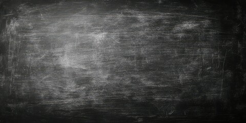 Blackboard surface with chalk marks ready for writing or drawing in a classroom or educational setting