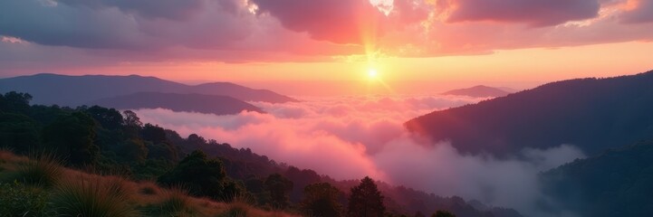 Radiant dawn breaks through clouds, soft mist blankets hills, nature photography, golden hour light