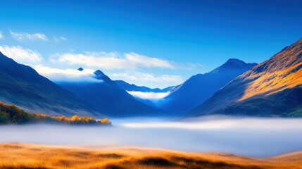 A serene landscape showcasing majestic mountains surrounded by mist and vibrant autumn colors, creating a peaceful and idyllic view that captures nature's beauty.