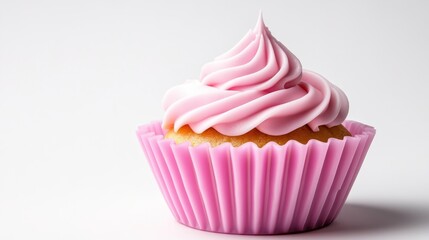 A single cupcake with luscious pink frosting in a decorative wrapper stands out against a neutral background, symbolizing treats and joyful moments.