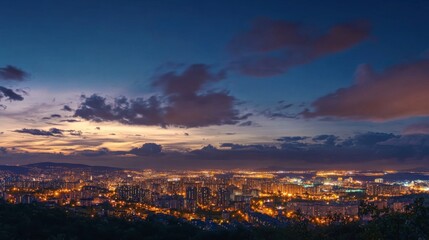 Obraz premium City skyline at twilight, urban landscape