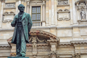 The monument to Alessandro Manzoni is a statue in Piazza San Fedele in Milan