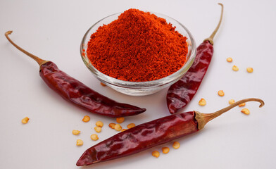 Aloe gel dropping from fresh cut of aloe vera leaf , macro shot on white background. Selective focus.