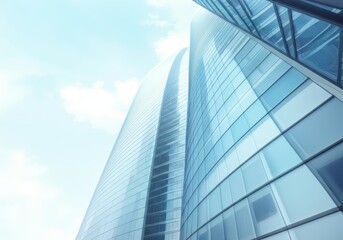 Obraz premium Modern skyscraper with sleek glass facade reaching towards the sky