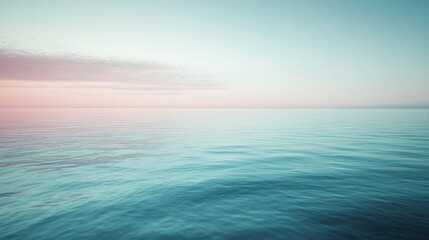 Fototapeta premium Serene coastal sunset over calm waters reflecting soft pastel colors with gentle waves