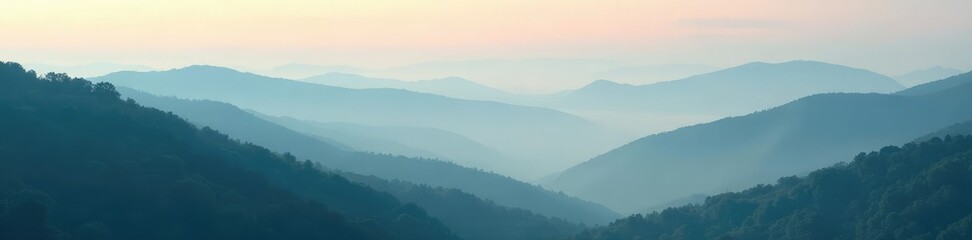 Fototapeta premium Foggy hills shrouded in misty morning atmosphere, natural scenery, landscape, morning
