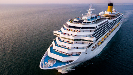 A cruise ship is sailing at sea.
