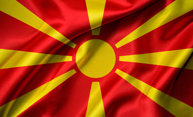 Macedonia national flag with realistic fabric texture and smooth folds waving in the wind.