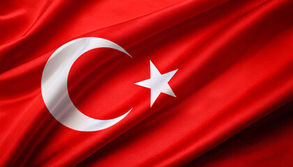 Obraz premium Turkey national flag with realistic fabric texture and smooth folds waving in the wind.