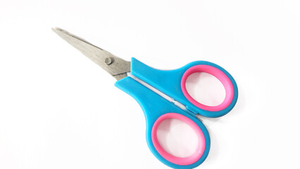 Stainless steel scissors with blue handles on a white background