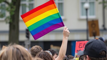 Pride flag at peaceful protest for LGBTQ rights