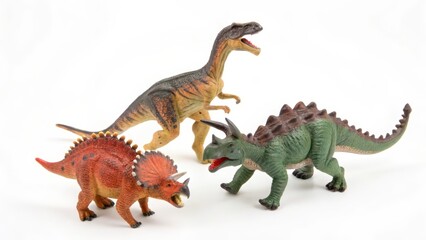 Three Dinosaur Toys on White Background