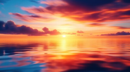 Obraz premium A breathtaking sunset over calm waters, reflecting vibrant hues of orange, pink, and purple in the sky. The serene landscape evokes a sense of tranquility and natural beauty.