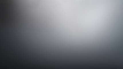 A blurry gray background with a white object in the foreground