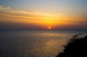 Beautiful sunset on the sea coast.