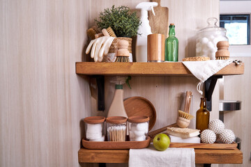 wooden shelf with accessories and cleaning products for washing, eco-friendly cleaning