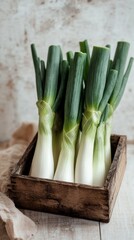 fresh leeks in a wooden box