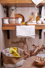 wooden shelf with accessories and cleaning products for washing, eco-friendly cleaning
