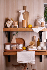wooden shelf with accessories and cleaning products for washing, eco-friendly cleaning
