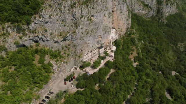 Drone view of Ostrog Monastery in the cliff high on the mountain in Montenegro