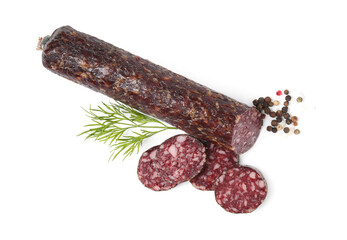 Delicious dry cured sausage and spices isolated on white, top view