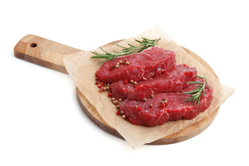 Pieces of raw beef meat, rosemary and peppercorns isolated on white