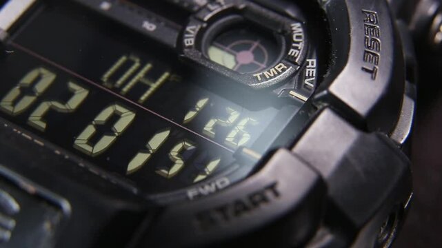 LCD display of a tough sports watch with running timer and stopwatch 
