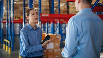 Warehouse worker stack hand and shake hands to show success in the warehouse. Worker industry join...