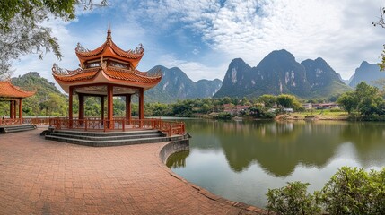 Scenic Lakeside Pavilion with Karst Mountains Background