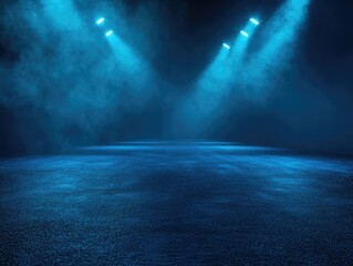 Obraz premium A large, empty concert stage with blue lights and smoke effects emanating from the floor.