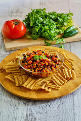 toasted corn and black bean salsa served with chips