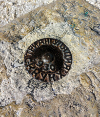 Triangulation sign on the top of Maloe Sedlo mountain, Kislovodsk National Park, Kislovodsk