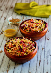 red and green cabbage coleslaw made with a mustard vinegar dressing
