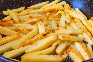  potatoes on the iron frying pan
