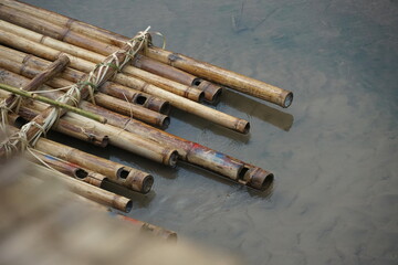 Bamboo rafts on calm waters scenic nature close-up view tranquil environment creative photography