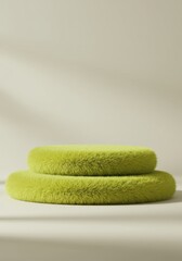 A vibrant green podium with a soft, furry texture is presented on a neutral backdrop. This unique structure is perfect for showcasing products or awards