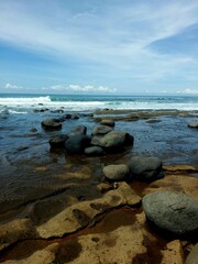 Enjoying the ocean view at Yeh Leh beach, Bali.