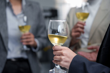 Business Professionals Socializing with White Wine