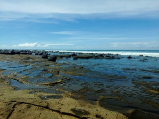 Enjoying the ocean view at Yeh Leh beach, Bali.