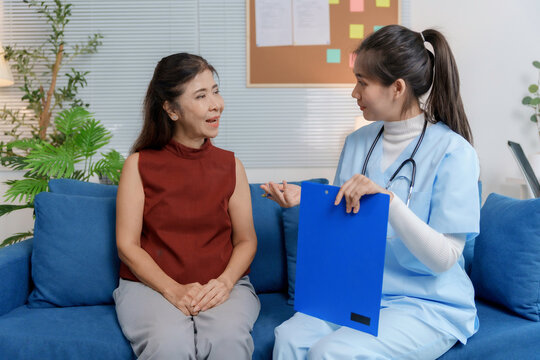 Doctor explaining diagnosis to patient during home visit