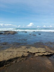 Enjoying the ocean view at Yeh Leh beach, Bali.