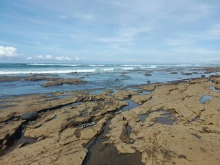 Enjoying the ocean view at Yeh Leh beach, Bali.