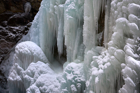 Frozen Water Layers on Cliff Face