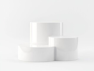 A minimalist arrangement of three white geometric forms, showcasing smooth surfaces and a clean aesthetic.