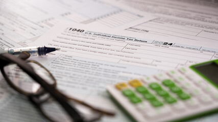 Tax return documents highlighting important financial information